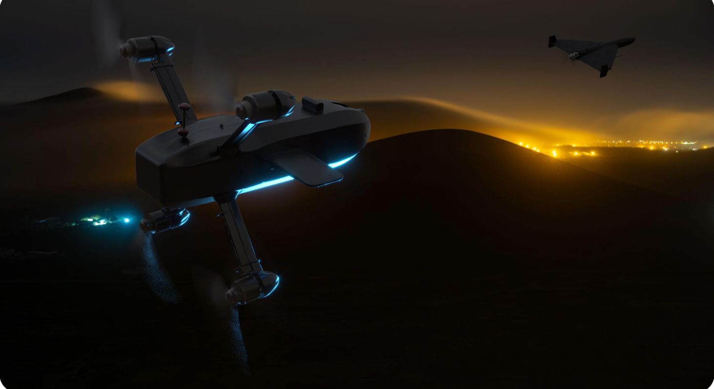 A DartStrike autonomy-assisted interceptor tracking a low-cost attack drone over a desert landscape at dusk